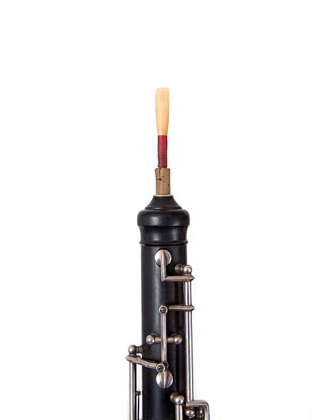 Oboe Reed with Red Thread and Top of Oboe stock photo