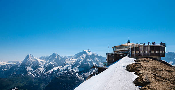 Observatory on top of snowy mountain in Switzerland stock photo