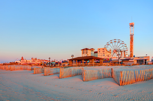 Ocean City is on New Jersey's coastal Jersey Shore. The city has beaches and a boardwalk with shops and amusement parks