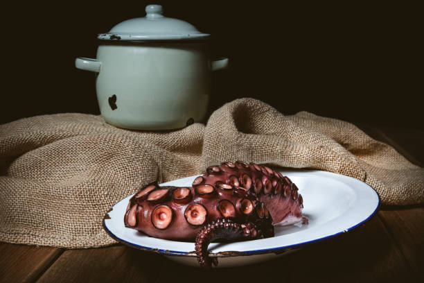 Octopus. Seafood in the restaurant. Octopus is prepared in the restaurant on the table. stock photo