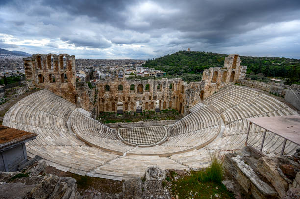 Odeon of Herodes Atticus The Odeon of Herodes Atticus is a stone Roman theater structure located on the southwest slope of the Acropolis of Athens, Greece. The building was completed in 161 AD and then renovated in 1950. ancient history stock pictures, royalty-free photos & images