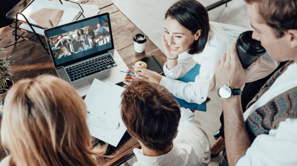 Office business teamwork concept. Video call with another remote working department stock photo