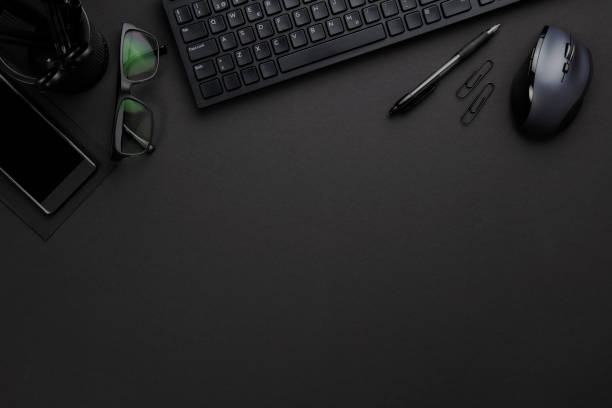 Office Equipment With Computer Keyboard And Mouse On Gray Desk stock photo