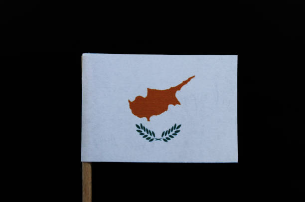 A official and beautiful flag of Cyprus on toothpick on black background. An outline of the country of Cyprus above twin olive branches on a white field A official and beautiful flag of Cyprus on toothpick on black background. An outline of the country of Cyprus above twin olive branches on a white field. varosha cyprus stock pictures, royalty-free photos & images