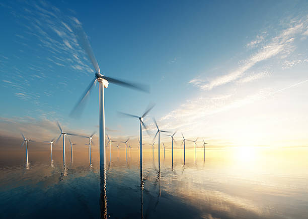 Offshore wind park at daybreak Offshore wind park at daybreak. 3d rendering. wind turbine stock pictures, royalty-free photos & images