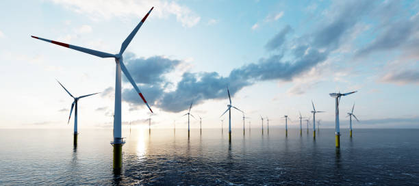 Offshore wind turbines Offshore wind turbines farm on the ocean. Sustainable energy wind turbine stock pictures, royalty-free photos & images