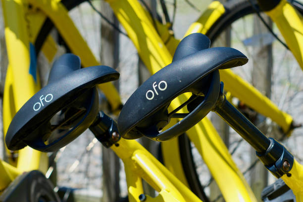 Ofo Rental Bikes Tangier Island, Virginia / USA - June 21, 2020: Ofo ride sharing bicycles are lined up awaiting users at this popular Chesapeake Bay travel destination. tangier island stock pictures, royalty-free photos & images