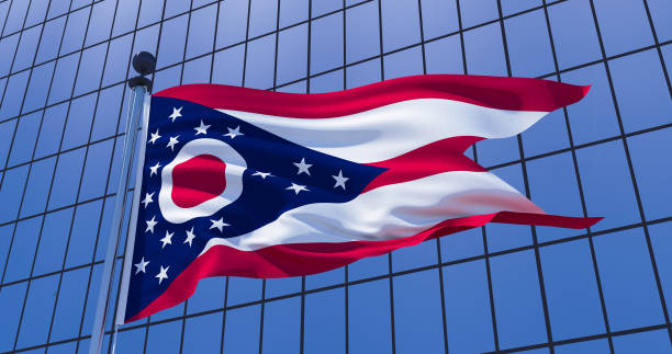 Ohio state state flag on skyscraper building background. 3d illustration stock photo