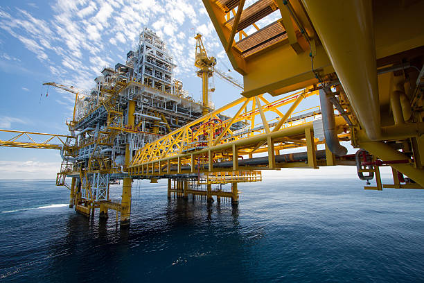 Oil and gas construction in offshore Oil and gas platform in the gulf or the sea, The world energy, Offshore oil and rig construction. oil industry stock pictures, royalty-free photos & images