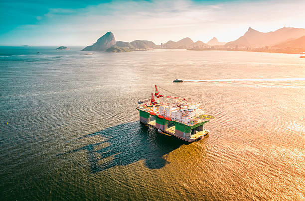 Oil drilling rig against panorama of Rio De Janeiro, Brazil stock photo