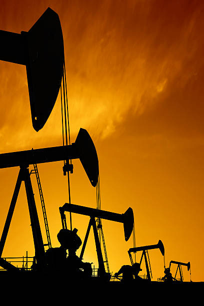 XXXL oil pumpjack silhouettes stock photo