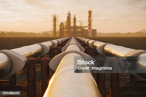 istock Oil Refinery And Pipeline In Desert During Sunset 1334186403