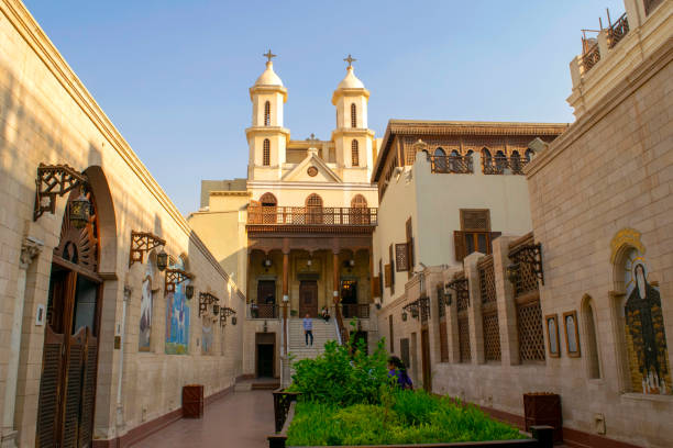 Old beautiful Orthodox Church in Cairo. Christian Coptic Hanging Church entrance. Cairo - Egypt - October 03, 2020: Old beautiful Orthodox Church in Cairo. Christian Coptic Hanging Church entrance. Saint Virgin Mary's Coptic Orthodox Church. coptic stock pictures, royalty-free photos & images