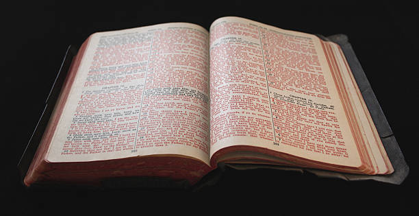 old Bible with red text stock photo