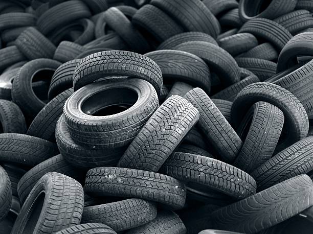 Old black car tire rubber stock photo