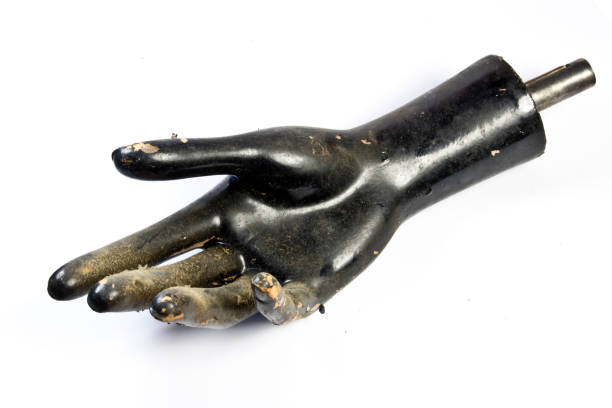 Old Black Mannequin Hand on White Background Old Black Mannequin Hand on White Background broken doll 1 stock pictures, royalty-free photos & images