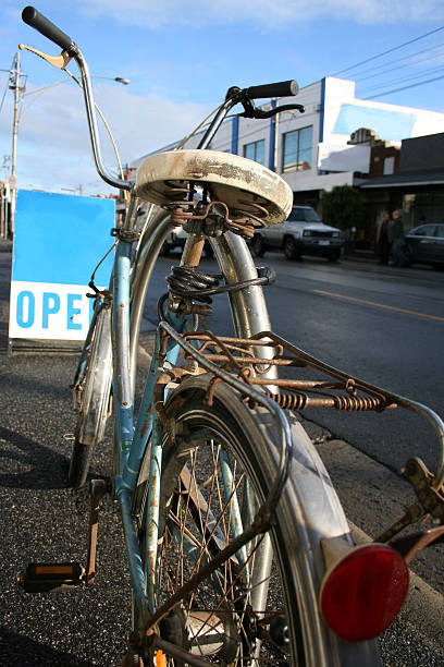 old blue bicycle stock photo