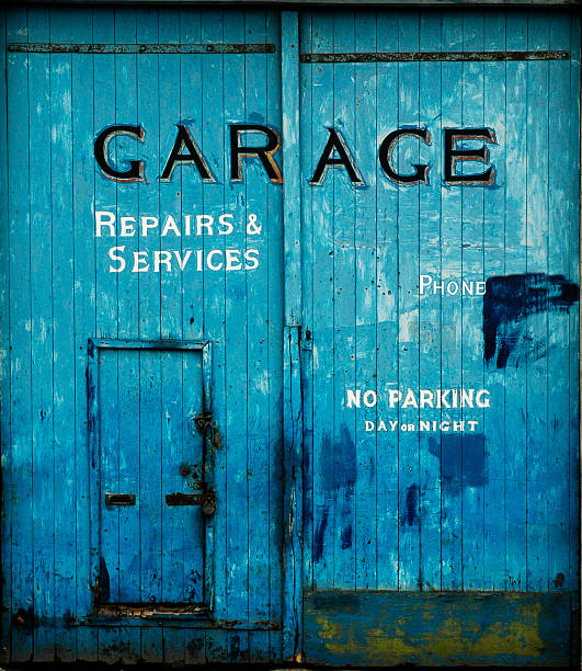Old blue garage doors stock photo