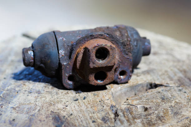 Old Brake slave cylinder and rusted.Expire cylinder.Old Brake Slave stock photo