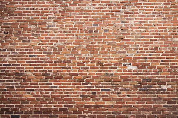 Old brick wall background Old brick wall background brick wall stock pictures, royalty-free photos & images
