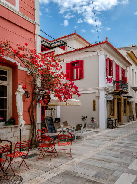 Old buildings in Nafplio, Greece. Nafpio, Greece - April 30 2018: Beautiful traditional buildings in the old town. Nafplio (or Nauplion ) is a historic city, being the first capital of the modern Greek state and now it's a major tourist destination. peloponnese stock pictures, royalty-free photos & images