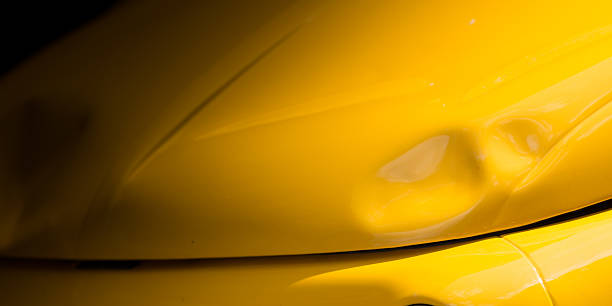Old car bashed car body Old car bashed car body, vivid yellow color dented stock pictures, royalty-free photos & images