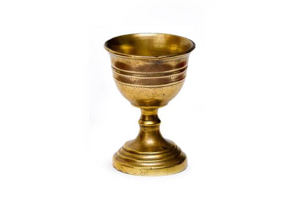 Old chalice Ancient bronze chalice isolated in white background chalice photos stock pictures, royalty-free photos & images