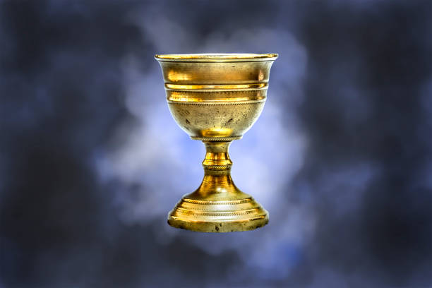 Old chalice Old chalice on blue clouds background chalice photos stock pictures, royalty-free photos & images