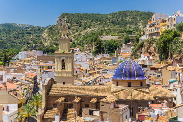 Old church with blue dome in the historic center of Bunol, Spain stock photo