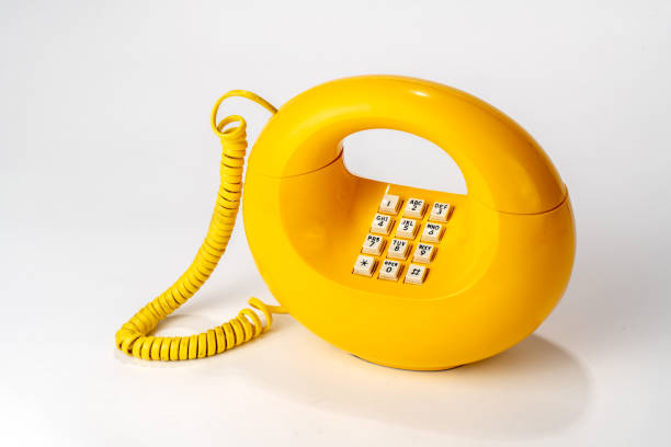 Old Circular Retro Telephone, one piece rotary dial on bottom stock photo