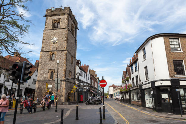 Old clock tower and street in St Albans. stock photo