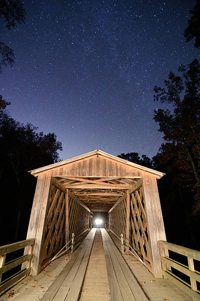 Photo of Old Covered Bridge at Night in the Country
