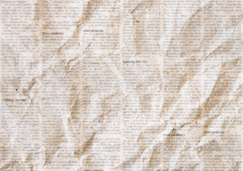 Old crumpled newspaper texture background