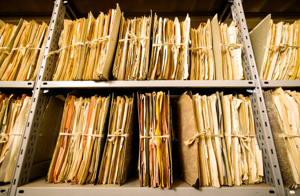 old documents at a rack - nice background stock photo