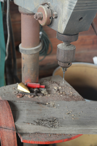Old Drill Press In Workshop With Other Tools Stock Photo