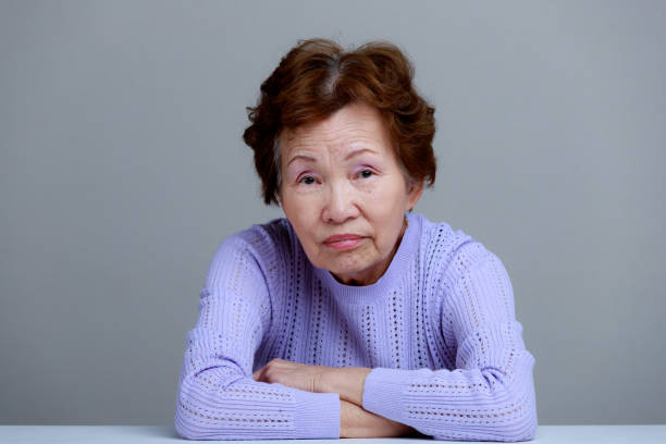 old elderly woman old elderly woman worried asian grand mother stock pictures, royalty-free photos & images