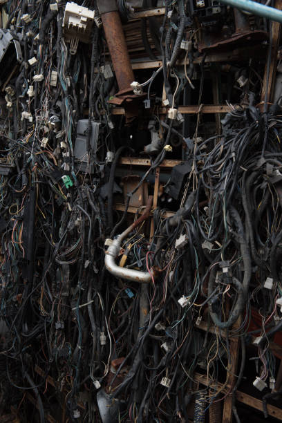 Old electric cables in junkyard stock photo