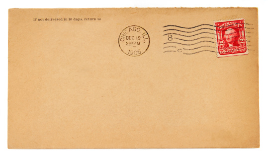 Old envelope with a 1906 Chicago postmark and a two cent, red, President Washington postage stamp. Weathered brown paper from natural aging. Postal history and ephemera. Plenty of copyspace to add address information of your choice. More envelopes: