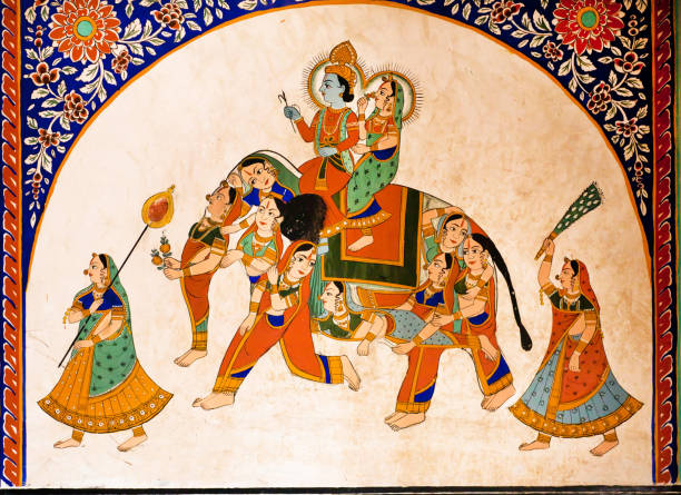 Old fresco with Krishna and Radha riding the weird elephant stock photo