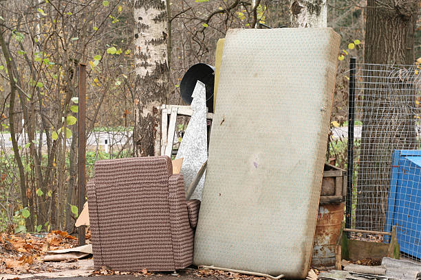 Old furniture abandoned at the roadside stock photo