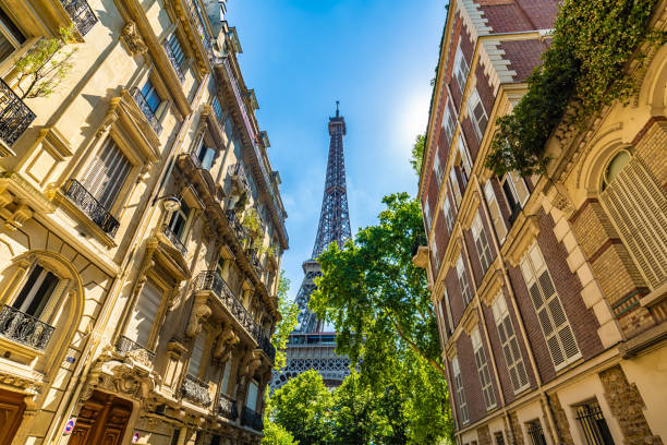 Old houses in Paris with Eiffel tower stock photo