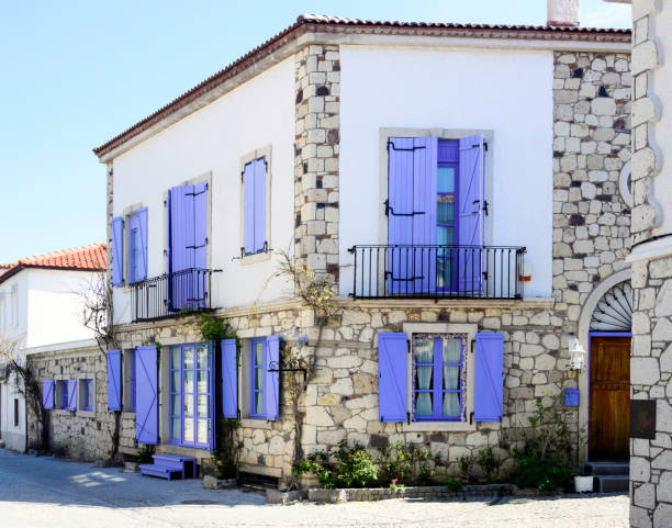 Old Houses view in historical Alacati Town. Alacati is populer tourist destination in Turkey. Old Houses view in historical Alacati Town. Alacati is populer tourist destination in Turkey. türkiye country photos stock pictures, royalty-free photos & images