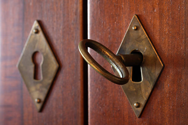 Old Key in Keyhole stock photo