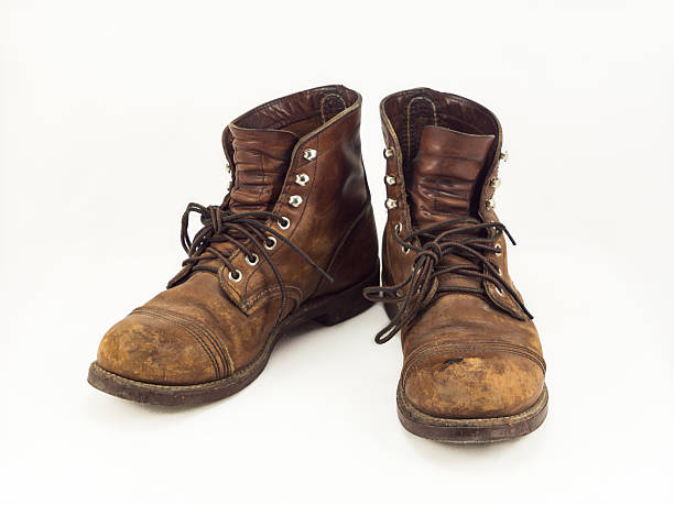 Dirty Work Boots Stock Photos, Pictures & Royalty-Free Images - iStock