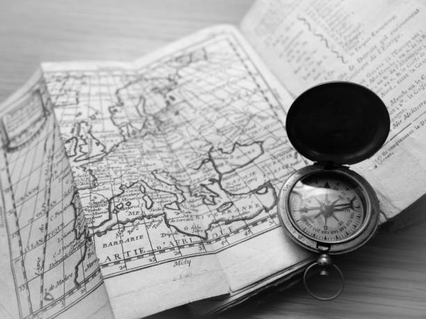 Old map and compass of Europe. stock photo