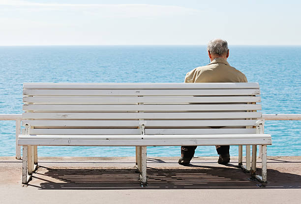 Old men by the sea. stock photo