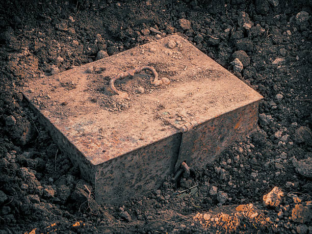Old metal chest with treasure Old metal chest with the treasure found in the ground buried stock pictures, royalty-free photos & images