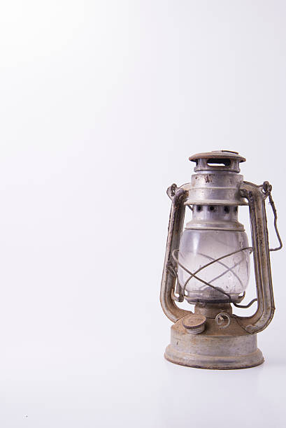 Old metallic dirty and rusty kerosene lamp stock photo