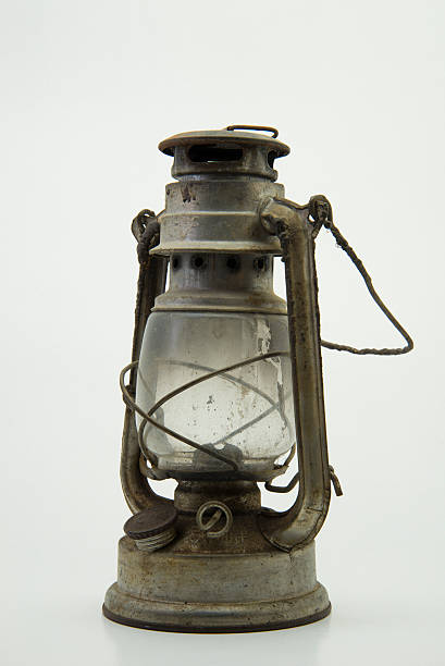 Old metallic dirty and rusty kerosene lamp stock photo