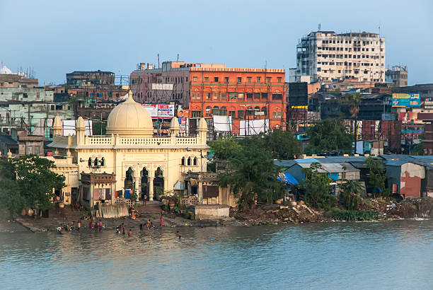 Old mosque riverside in Kolkata, India. Old mosque riverside from Howrah Bridge in Kolkata, India. kolkata stock pictures, royalty-free photos & images
